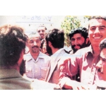 محمد اثری‌نژاد در کنار شهید رجایی